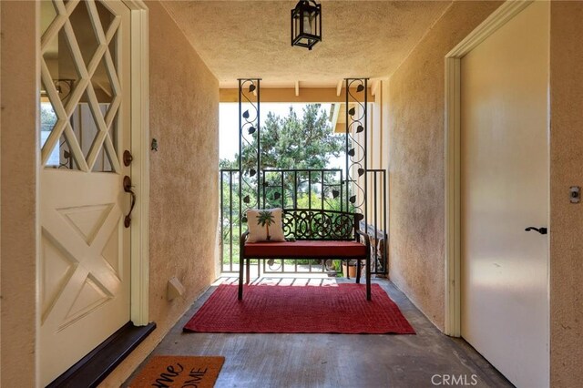 152 Spinks Canyon Rd, Bradbury, CA 91008 - doorway to outside featuring a textured wall