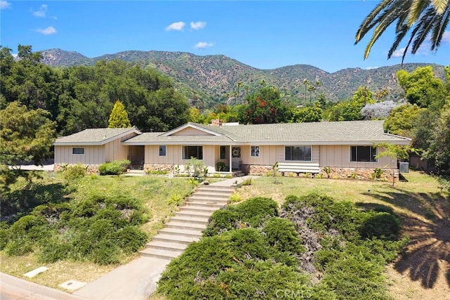 152 Spinks Canyon Rd, Bradbury, CA 91008 - view of front of home with a mountain view, board and batten siding, stone siding, stairs, and a front yard