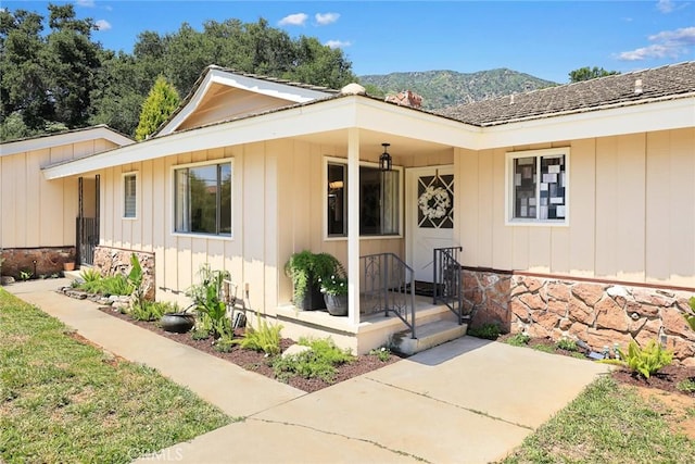 152 Spinks Canyon Rd, Bradbury, CA 91008 - property entrance with board and batten siding and a mountain view
