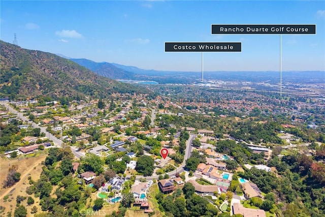 drone / aerial view of a mountainous background