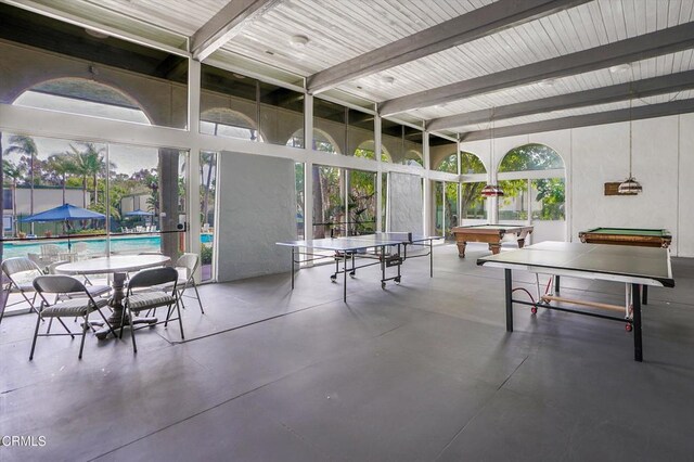 view of patio / terrace with an outdoor pool