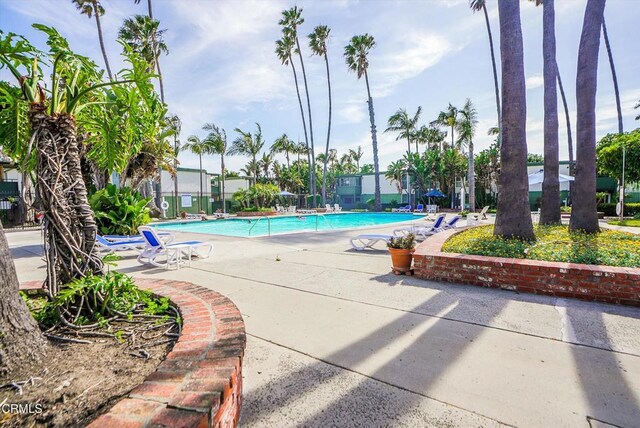 community pool featuring a patio