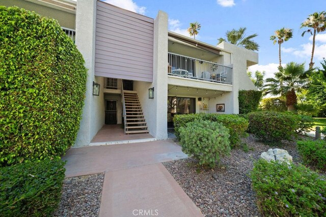 3155 E Ramon Rd Unit 607, Palm Springs, CA 92264 - view of building exterior featuring stairway
