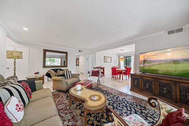 3155 E Ramon Rd Unit 607, Palm Springs, CA 92264 - living room featuring crown molding, light tile patterned floors, and baseboards