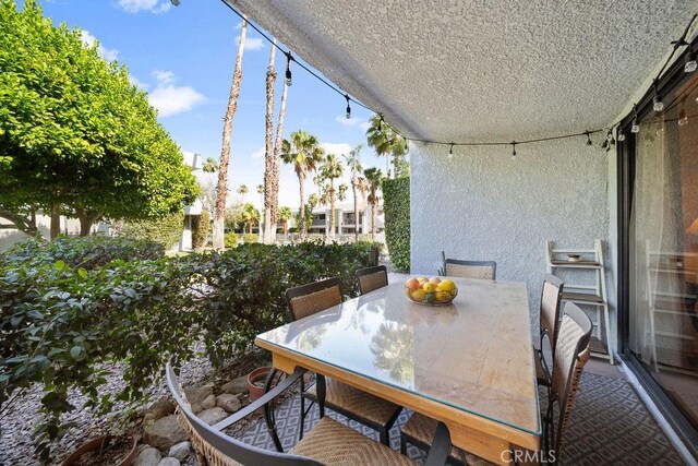 3155 E Ramon Rd Unit 607, Palm Springs, CA 92264 - view of patio / terrace featuring outdoor dining space