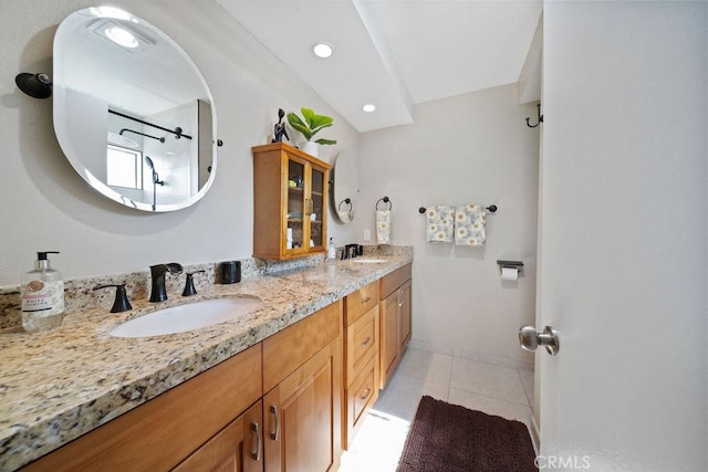 3155 E Ramon Rd Unit 607, Palm Springs, CA 92264 - full bath with tile patterned flooring, double vanity, recessed lighting, a shower, and baseboards