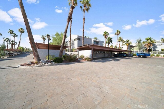 3155 E Ramon Rd Unit 607, Palm Springs, CA 92264 - view of front of property with covered parking and fence