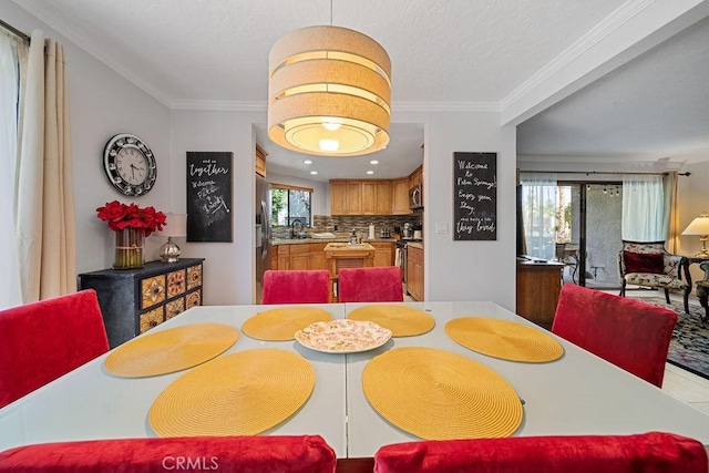 3155 E Ramon Rd Unit 607, Palm Springs, CA 92264 - dining room featuring crown molding