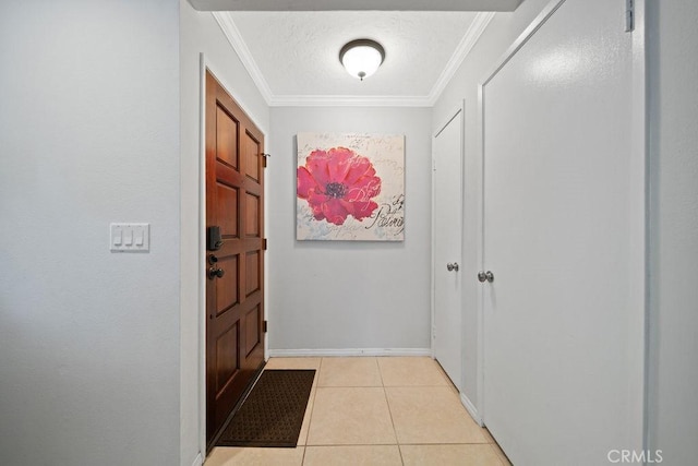 3155 E Ramon Rd Unit 607, Palm Springs, CA 92264 - entryway with ornamental molding, light tile patterned floors, and baseboards
