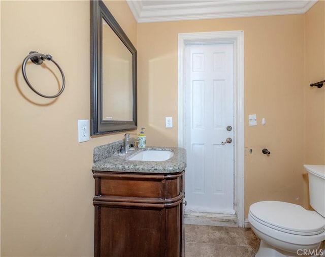 6371 Shawnee Rd, Westminster, CA 92683 - bathroom featuring vanity, toilet, baseboards, and ornamental molding