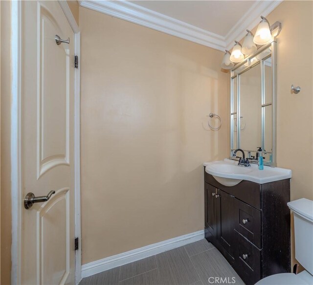 6371 Shawnee Rd, Westminster, CA 92683 - bathroom featuring vanity and crown molding