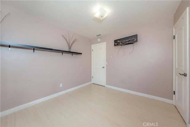 6371 Shawnee Rd, Westminster, CA 92683 - spare room with light wood finished floors and baseboards