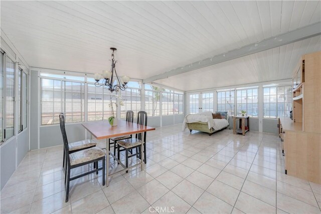 6371 Shawnee Rd, Westminster, CA 92683 - sunroom with tile patterned floors, a chandelier, and wood ceiling with exposed beams