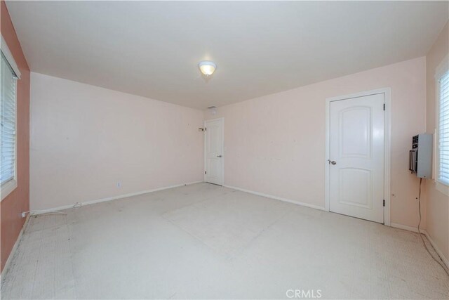 6371 Shawnee Rd, Westminster, CA 92683 - spare room with light carpet and baseboards