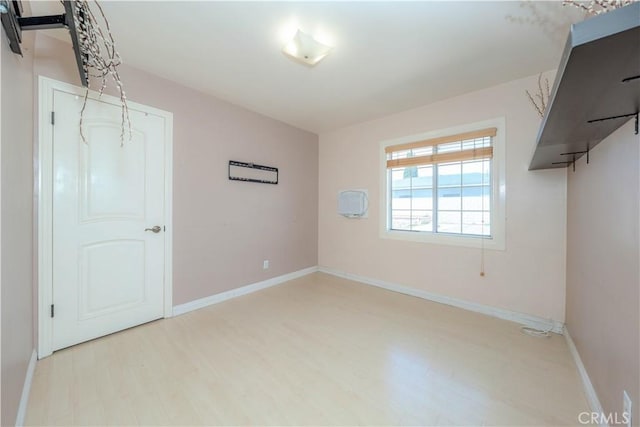 6371 Shawnee Rd, Westminster, CA 92683 - empty room featuring wood finished floors and baseboards