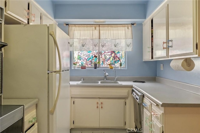 330 N Howard St Unit 201, Glendale, CA 91206 - kitchen featuring freestanding refrigerator, light countertops, and dishwashing machine
