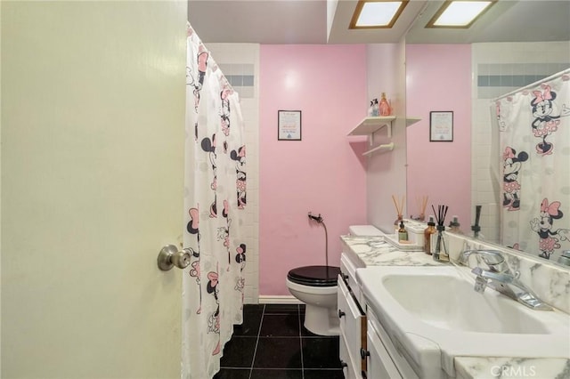 330 N Howard St Unit 201, Glendale, CA 91206 - full bath featuring tile patterned floors, vanity, and a shower with curtain