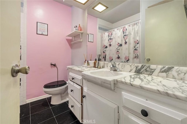 330 N Howard St Unit 201, Glendale, CA 91206 - full bath featuring tile patterned floors, toilet, vanity, and a shower with curtain