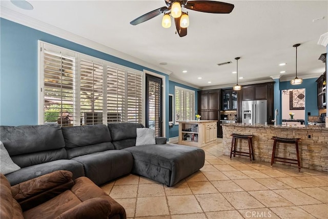 30463 Vineyard Ln, Castaic, CA 91384 - living area with crown molding, a ceiling fan, and recessed lighting