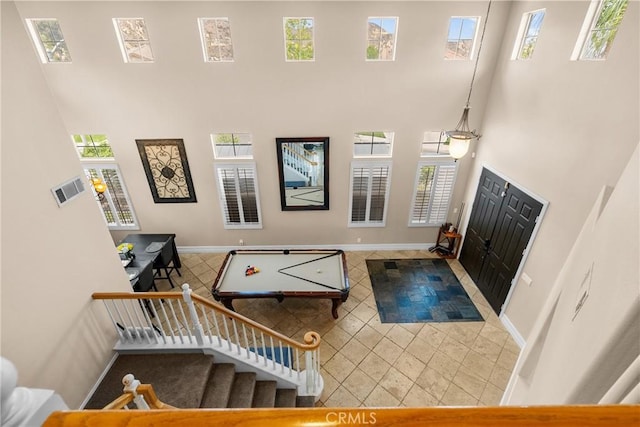 30463 Vineyard Ln, Castaic, CA 91384 - tiled entrance foyer featuring a towering ceiling, healthy amount of natural light, baseboards, and stairway
