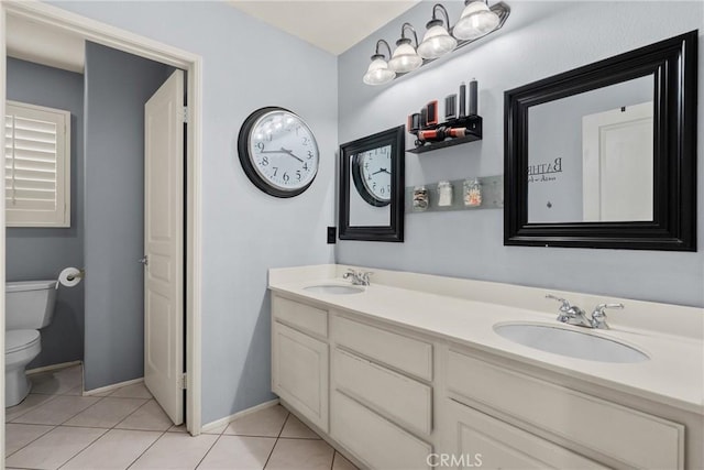 30463 Vineyard Ln, Castaic, CA 91384 - full bathroom featuring toilet, double vanity, tile patterned floors, and baseboards