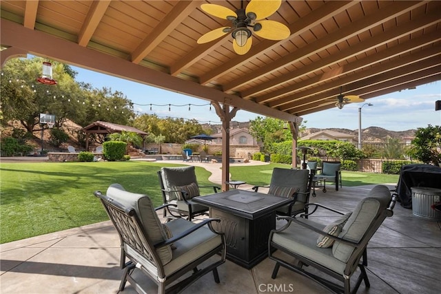 30463 Vineyard Ln, Castaic, CA 91384 - view of patio featuring a ceiling fan and a fire pit