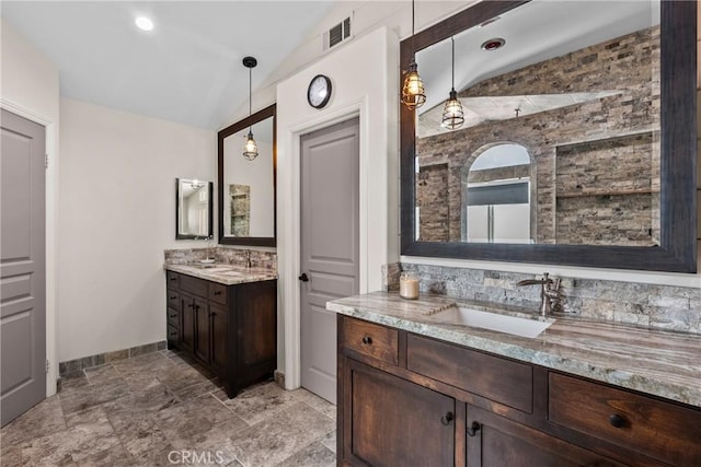 30463 Vineyard Ln, Castaic, CA 91384 - full bath featuring lofted ceiling, two vanities, and baseboards