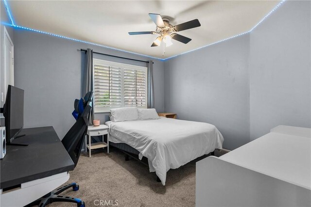 30463 Vineyard Ln, Castaic, CA 91384 - bedroom with light colored carpet, an office area, and a ceiling fan