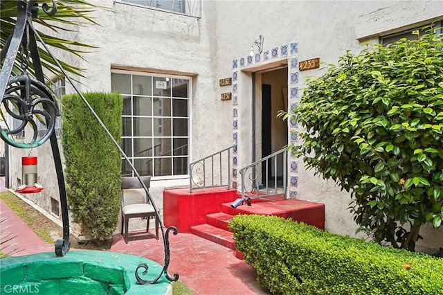 4235 Garthwaite Ave, Los Angeles, CA 90008 - doorway to property featuring stucco siding
