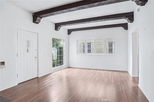 4235 Garthwaite Ave, Los Angeles, CA 90008 - unfurnished living room with wood finished floors, baseboards, and beam ceiling