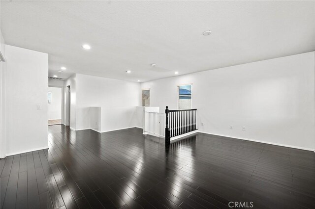 14271 Blackstone St, Hesperia, CA 92345 - unfurnished room featuring baseboards, recessed lighting, and wood finished floors