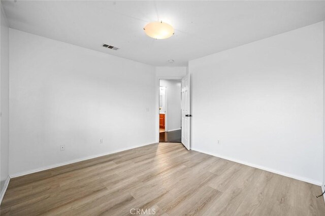 14271 Blackstone St, Hesperia, CA 92345 - spare room with light wood-style floors and baseboards