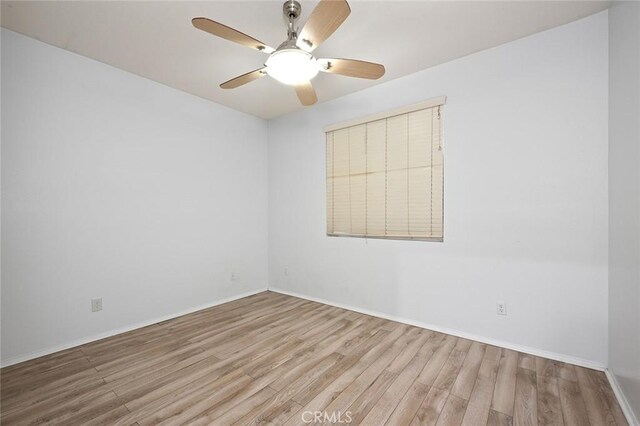 14271 Blackstone St, Hesperia, CA 92345 - spare room with wood finished floors, ceiling fan, and baseboards