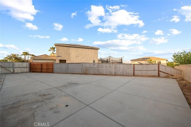 14271 Blackstone St, Hesperia, CA 92345 - view of patio featuring a fenced backyard and a gate