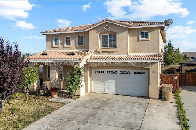 14271 Blackstone St, Hesperia, CA 92345 - mediterranean / spanish home featuring stucco siding, a tile roof, and driveway
