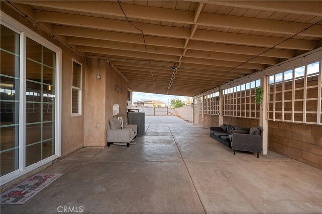 14271 Blackstone St, Hesperia, CA 92345 - view of patio with a fenced backyard and an outdoor hangout area