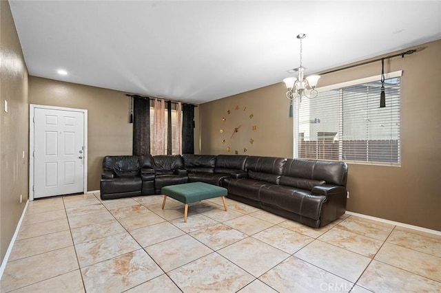 14271 Blackstone St, Hesperia, CA 92345 - living room featuring a chandelier, light tile patterned floors, and baseboards