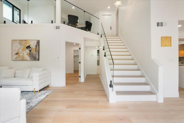2464 Haller St, San Diego, CA 92104 - stairs with wood finished floors, baseboards, a high ceiling, and recessed lighting