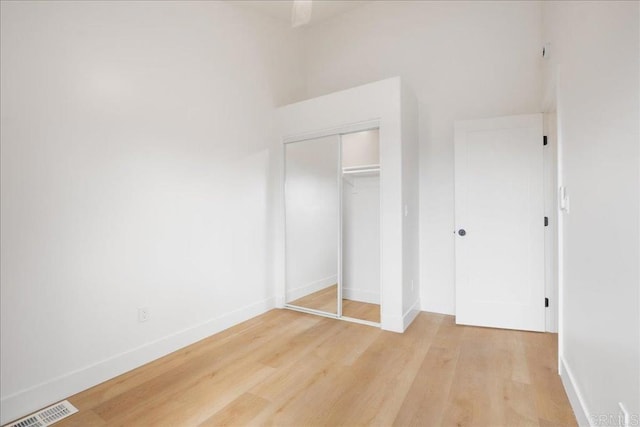 2464 Haller St, San Diego, CA 92104 - unfurnished bedroom with light wood-style floors, baseboards, and a closet