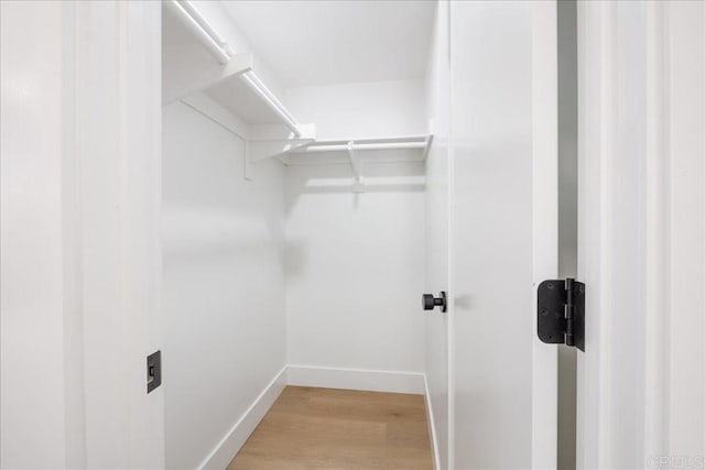 2464 Haller St, San Diego, CA 92104 - spacious closet featuring light wood-style floors