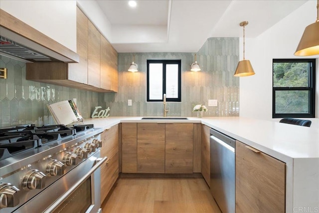 2464 Haller St, San Diego, CA 92104 - kitchen featuring stainless steel appliances, exhaust hood, plenty of natural light, and tasteful backsplash