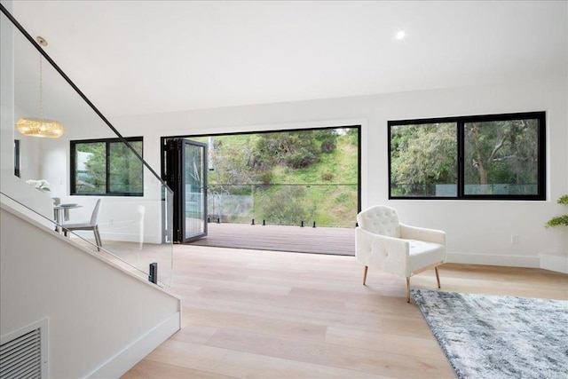 2464 Haller St, San Diego, CA 92104 - interior space with wood finished floors, a chandelier, and recessed lighting