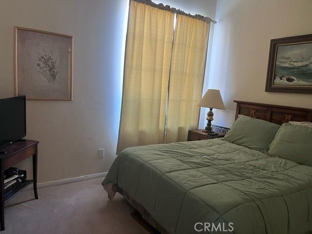 5001 Rolling Hls, Banning, CA 92220 - bedroom with carpet flooring and baseboards