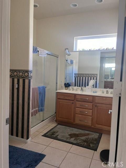 5001 Rolling Hls, Banning, CA 92220 - full bath featuring a stall shower, tile patterned flooring, and double vanity