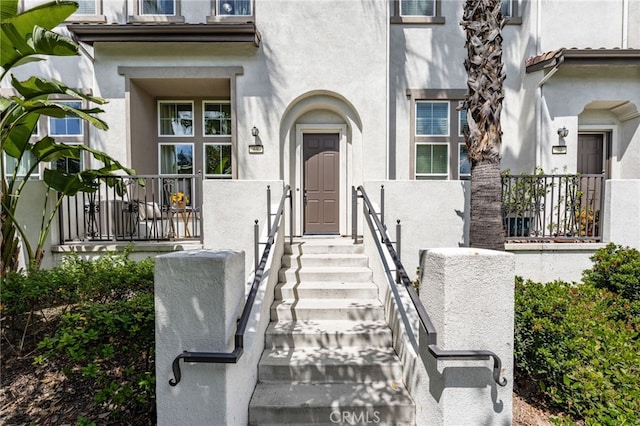 68 Webber Way, Buena Park, CA 90621 - doorway to property with stucco siding