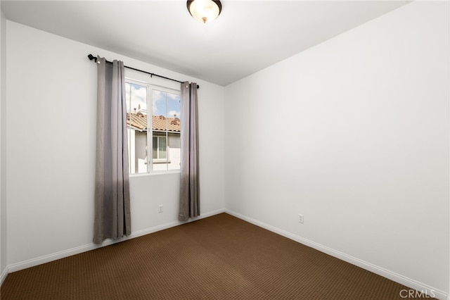 68 Webber Way, Buena Park, CA 90621 - spare room with dark colored carpet and baseboards