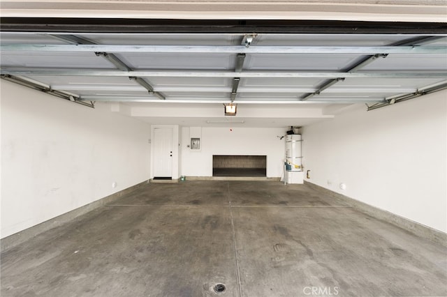68 Webber Way, Buena Park, CA 90621 - garage with secured water heater and a garage door opener