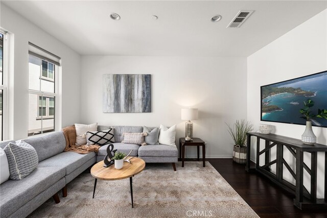 68 Webber Way, Buena Park, CA 90621 - living area featuring dark wood-type flooring, recessed lighting, and baseboards