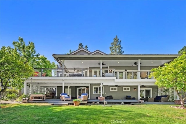 31852 Via Faisan, Coto De Caza, CA 92679 - rear view of house featuring ceiling fan, a lawn, and an outdoor living space
