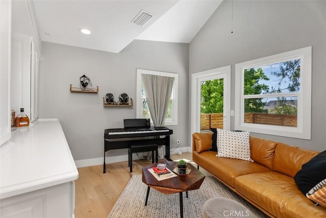 31852 Via Faisan, Coto De Caza, CA 92679 - living area with light wood-style flooring, baseboards, and high vaulted ceiling